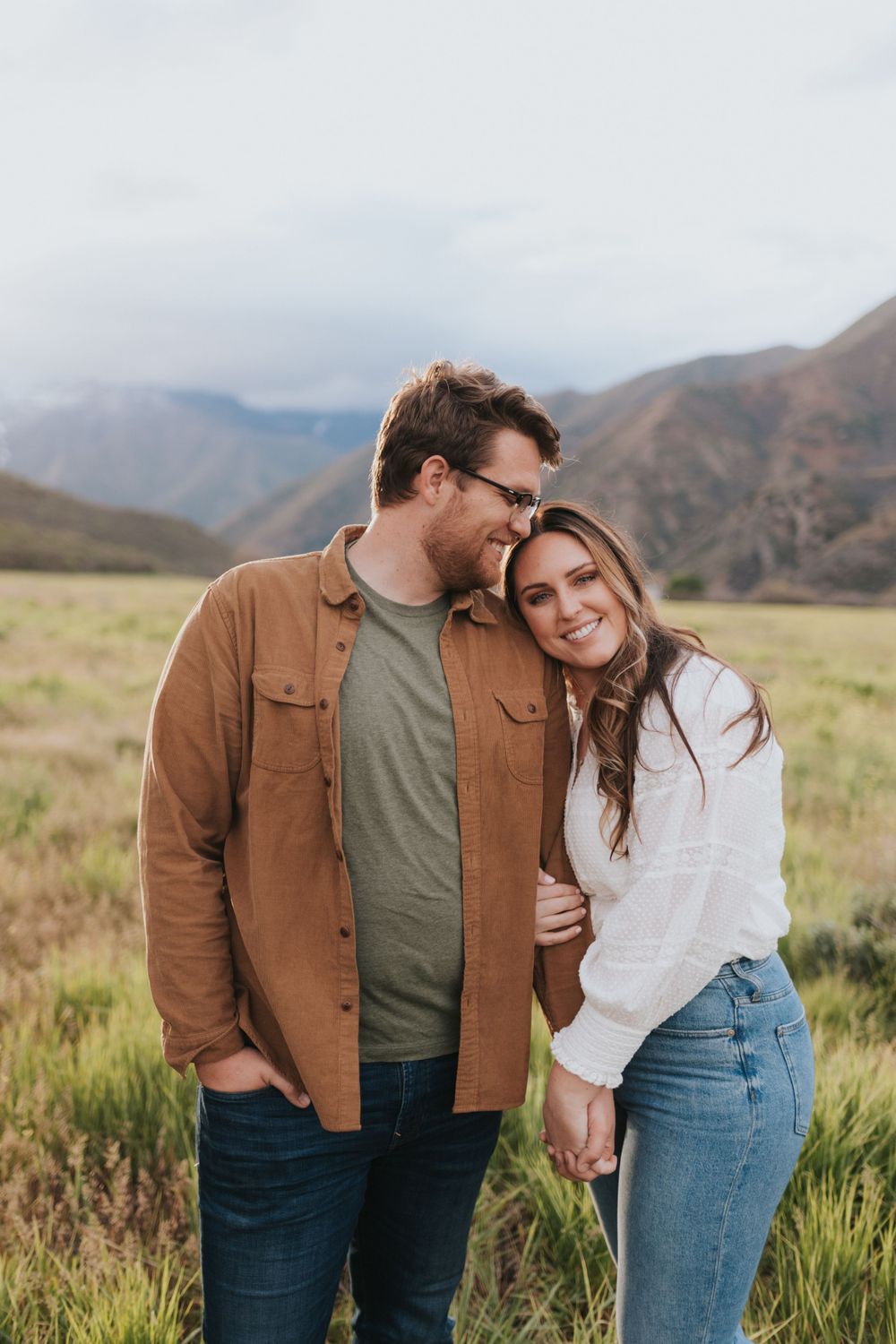 An engaged couple beautifully photographed during their summer engagement session in Provo Canyon, Utah.