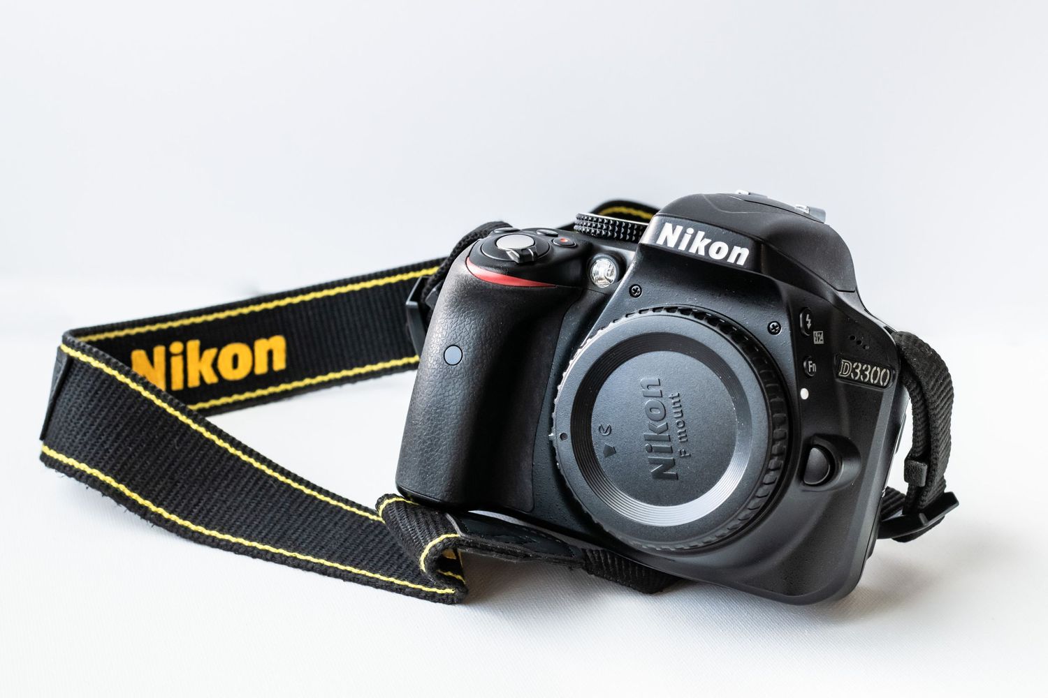 Nikon D3300 DSLR camera against white background