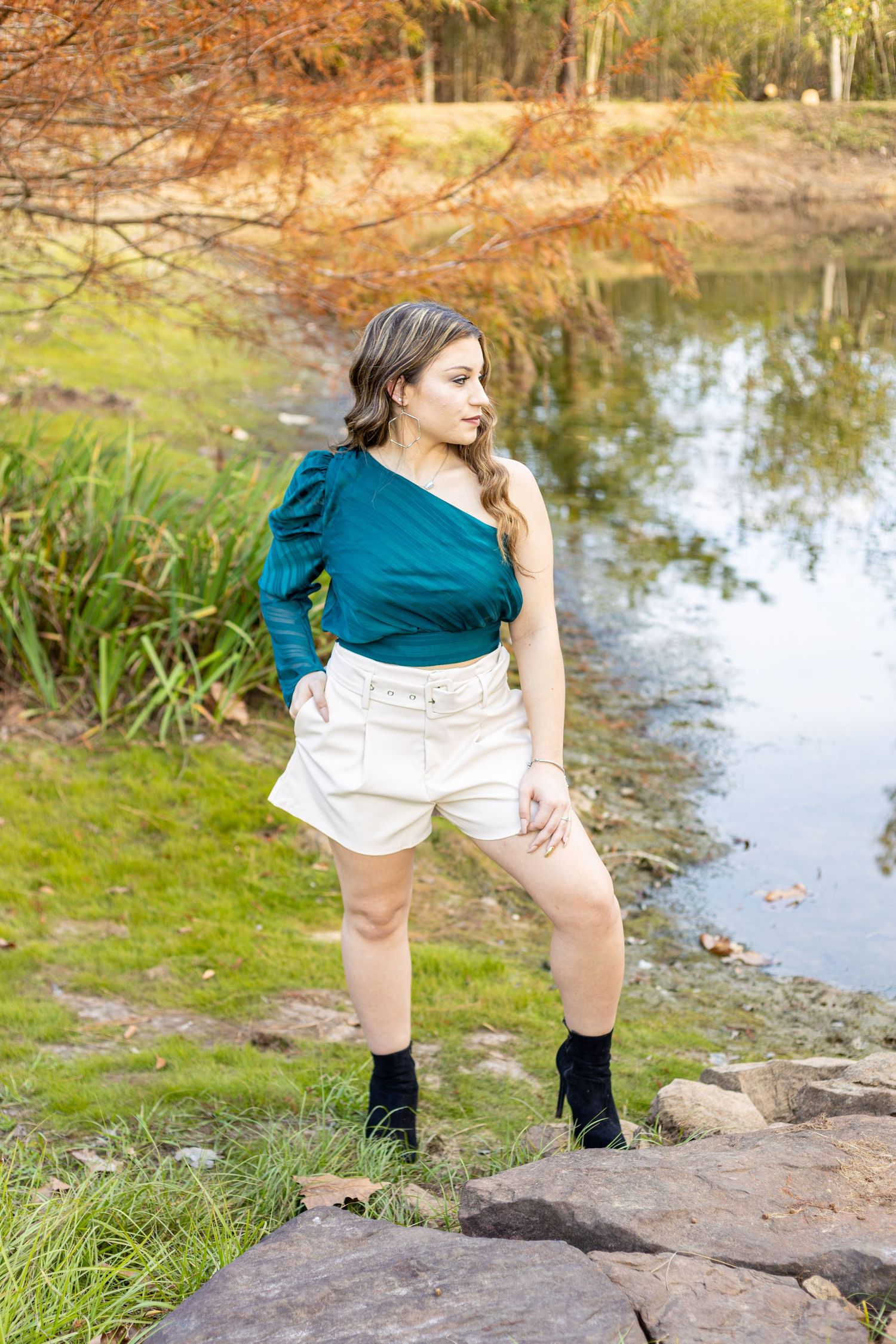 Senior girl by pond