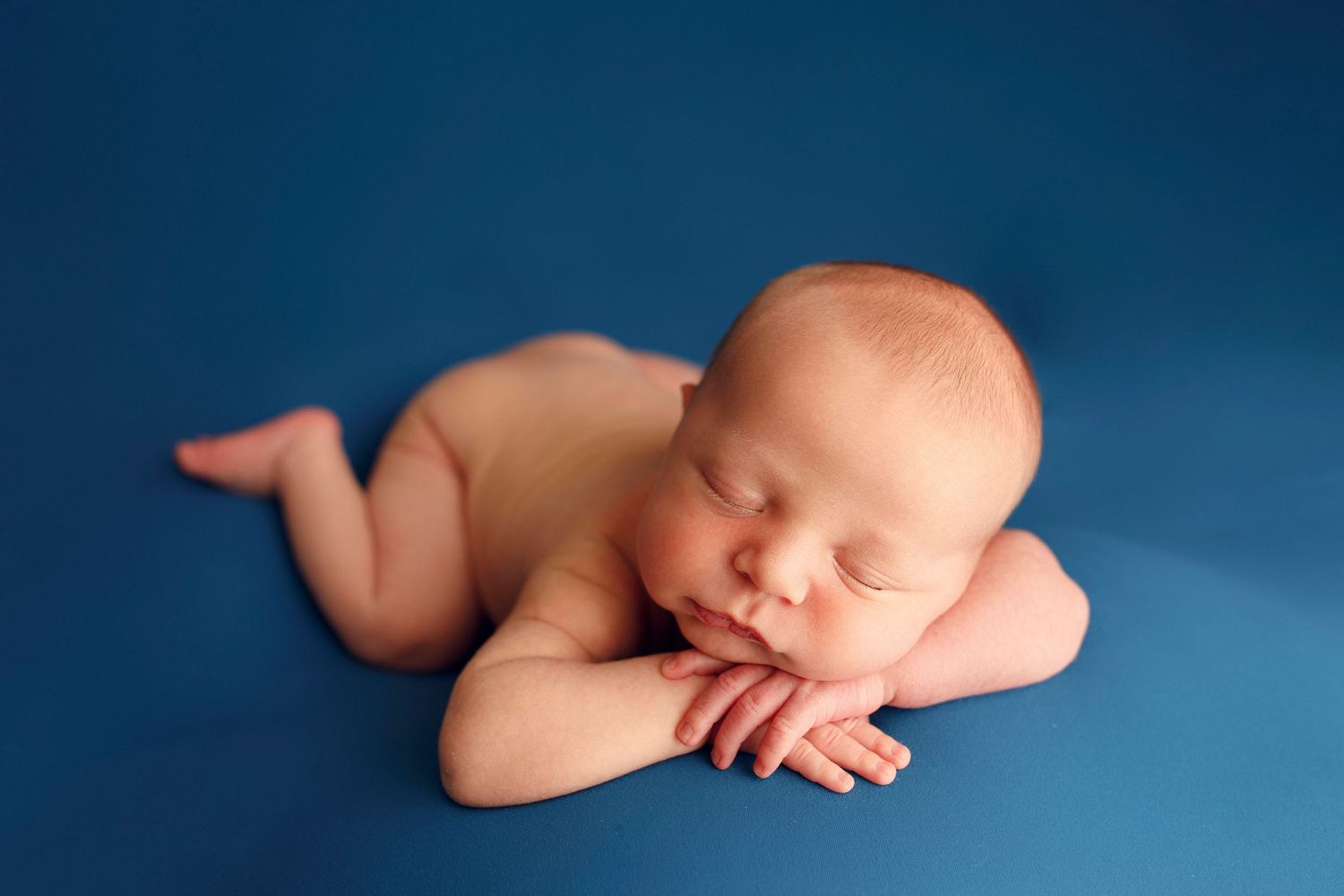 studio session photographer newborn session photographer sleepy baby boy