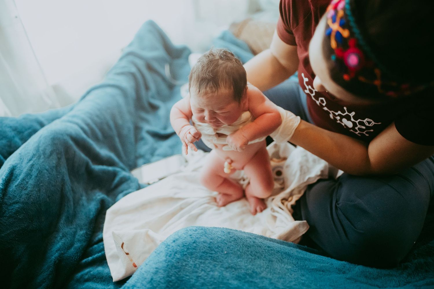 Home birth, birth doula, midwifery, orlando doula, water birth, newborn photography, maternity photography, birth photography, lactation