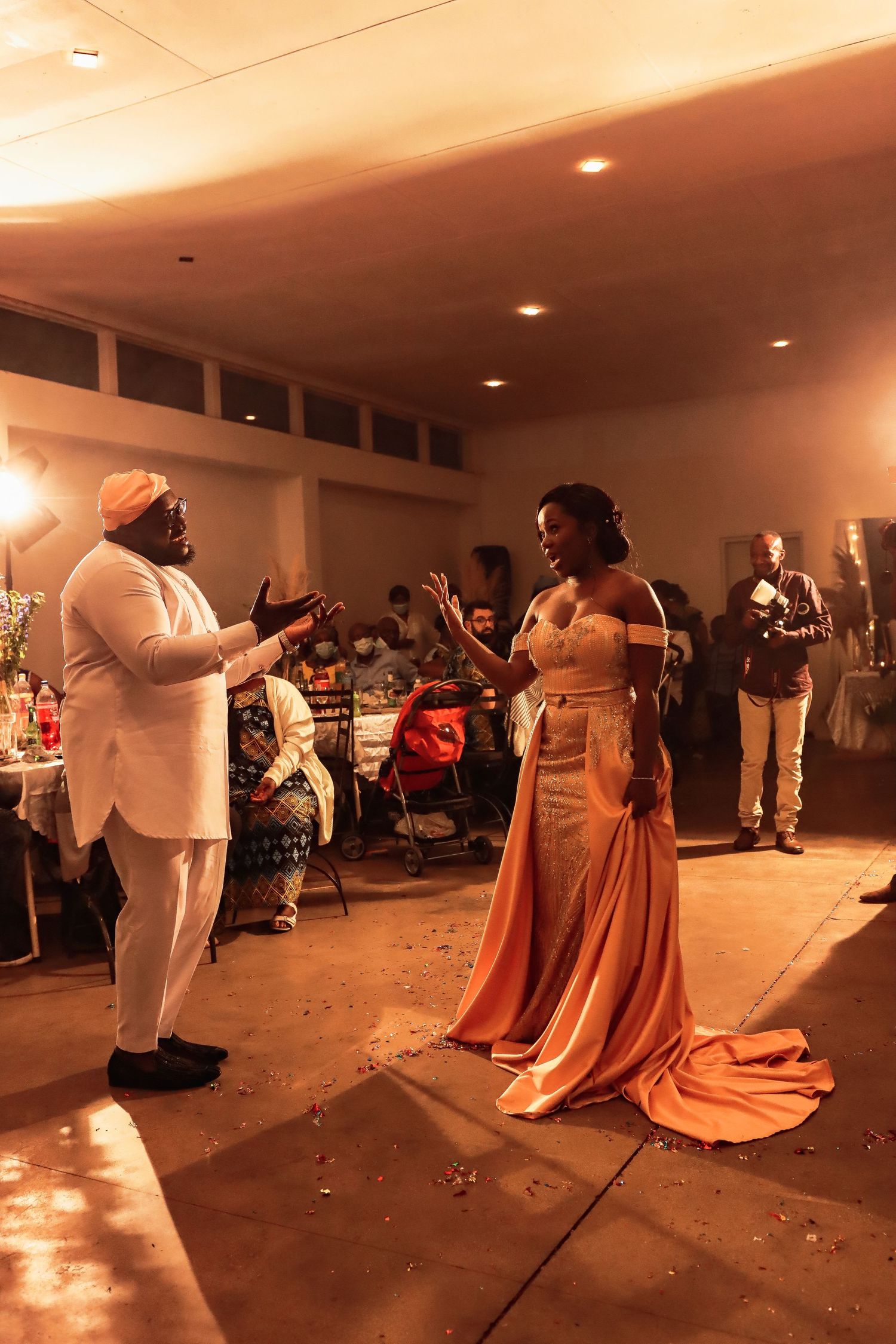 Couple sharing a joyful moment on the dance floor during their wedding celebration.
