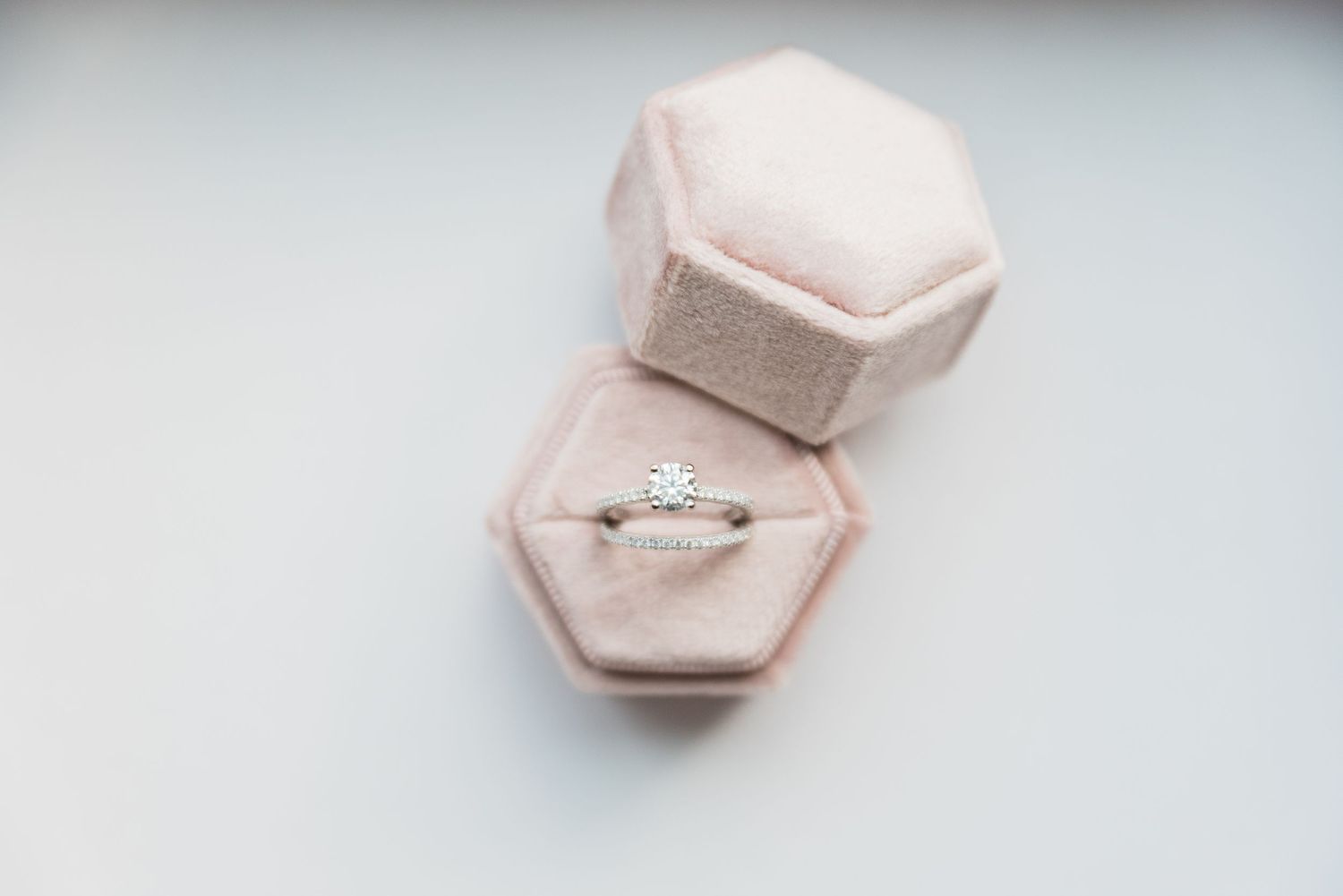 Wedding ring and band in box