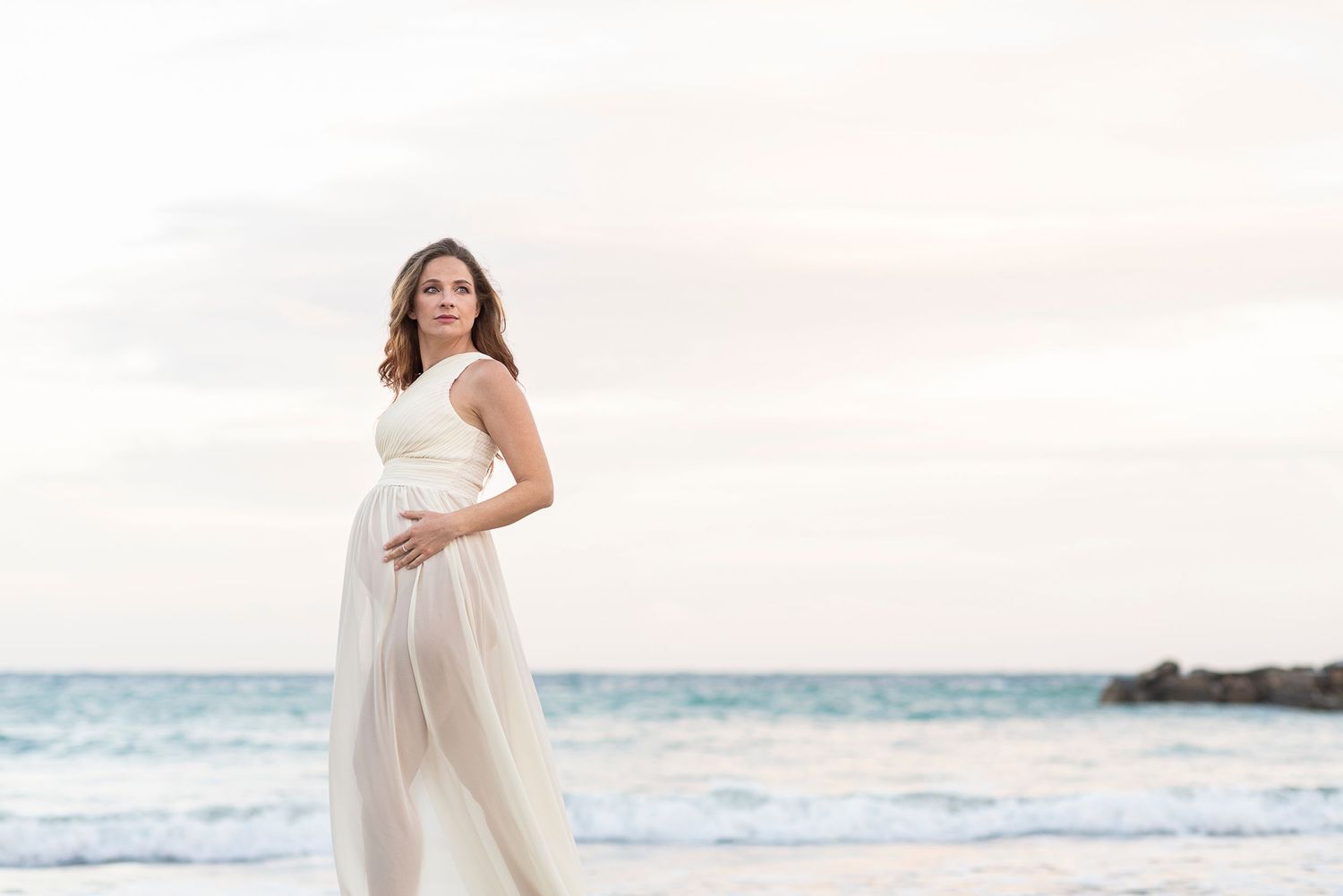 tramonto-mare-servizio-fotografico-donna-gravidanza