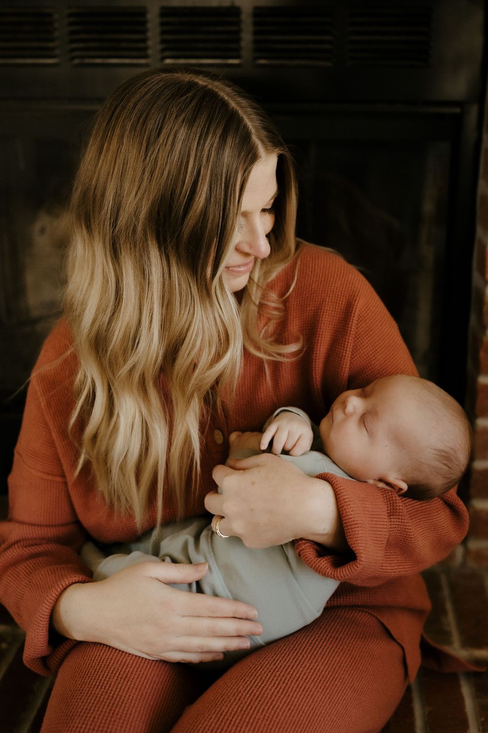 Candid family portrait in Joplin, Missouri captured in natural light by Modern Moods Imagery, showing genuine connection and movement.