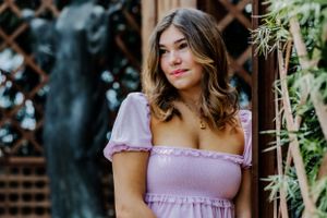 Beautiful stunning senior portrait of a girl looking off camera. Captures youth and vibrancy