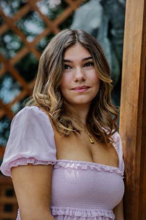 Beautiful stunning senior portrait of a girl looking off camera. Captures youth and vibrancy