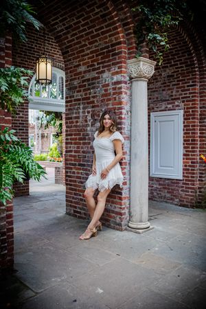 Brick archways and a stunning pose create an incredibly beautiful image