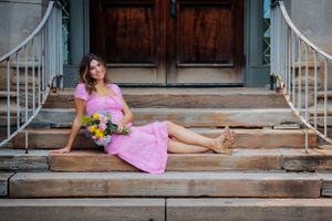 Feminine and classy, this sitting pose on stone steps is a guaranteed beautiful image