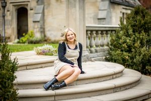 Feminine and classy, this sitting pose on stone steps is a guaranteed beautiful image