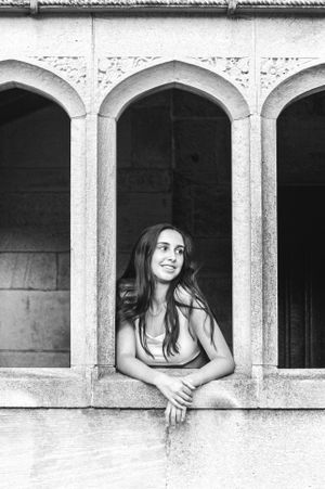 Beautiful stunning senior portrait of a girl looking off camera. Captures youth and vibrancy