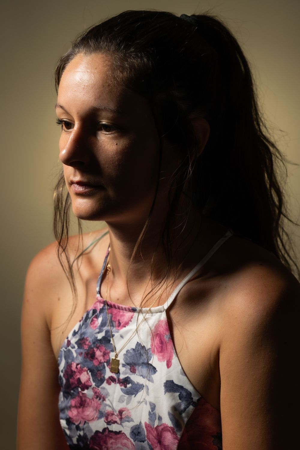 Artistic portrait series showing a person in a floral top with dramatic lighting and shadows.