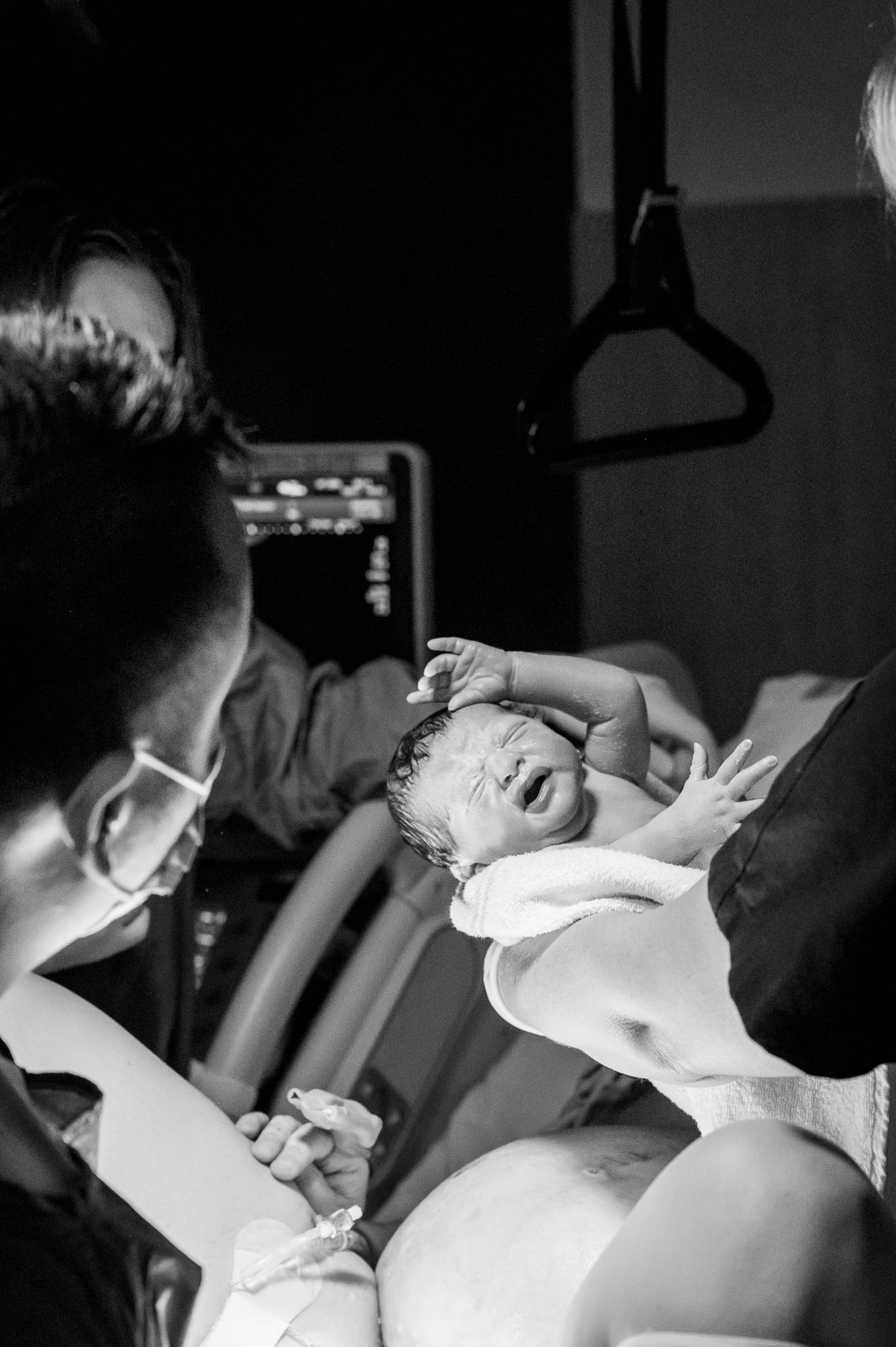 new baby being born in hospital