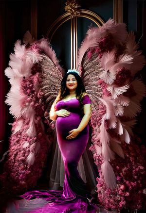 Fantasy portrait series with pink feathered wings and purple gown against dark dramatic backdrop.