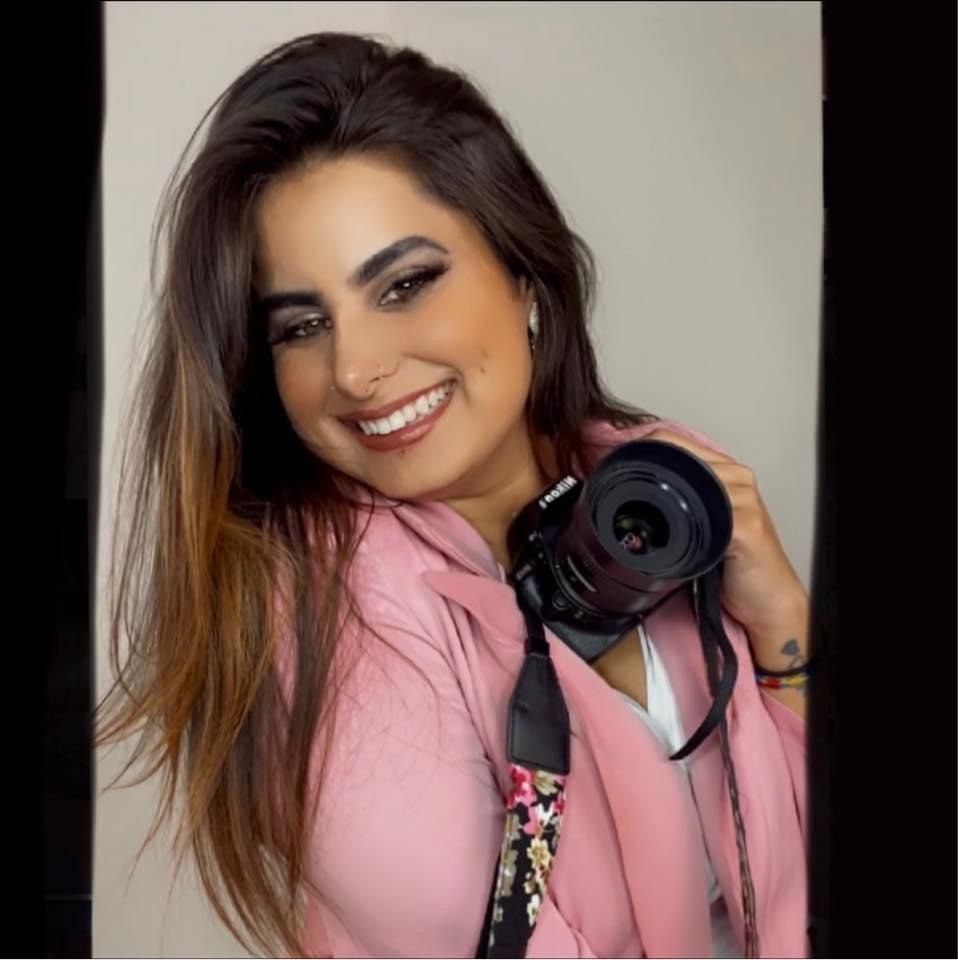 Florentina Marie, a professional photographer in Milwaukee, Wisconsin, behind the camera.