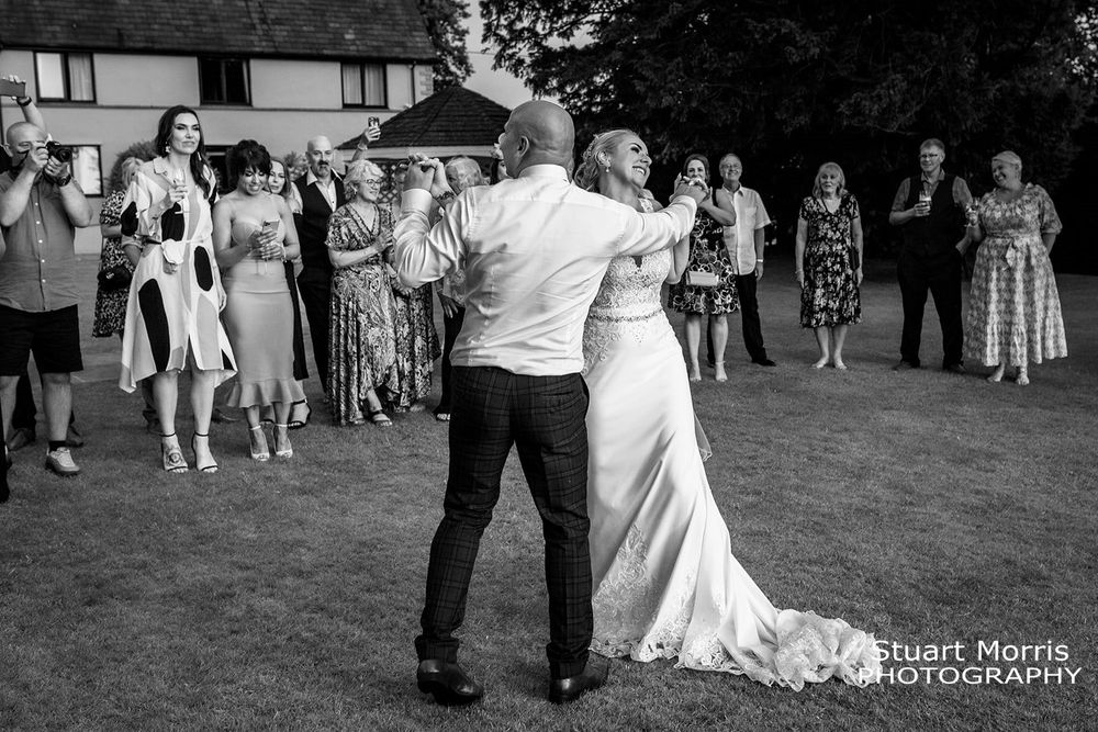 Bride and grooms first dance. West tower county house wedding photographer.