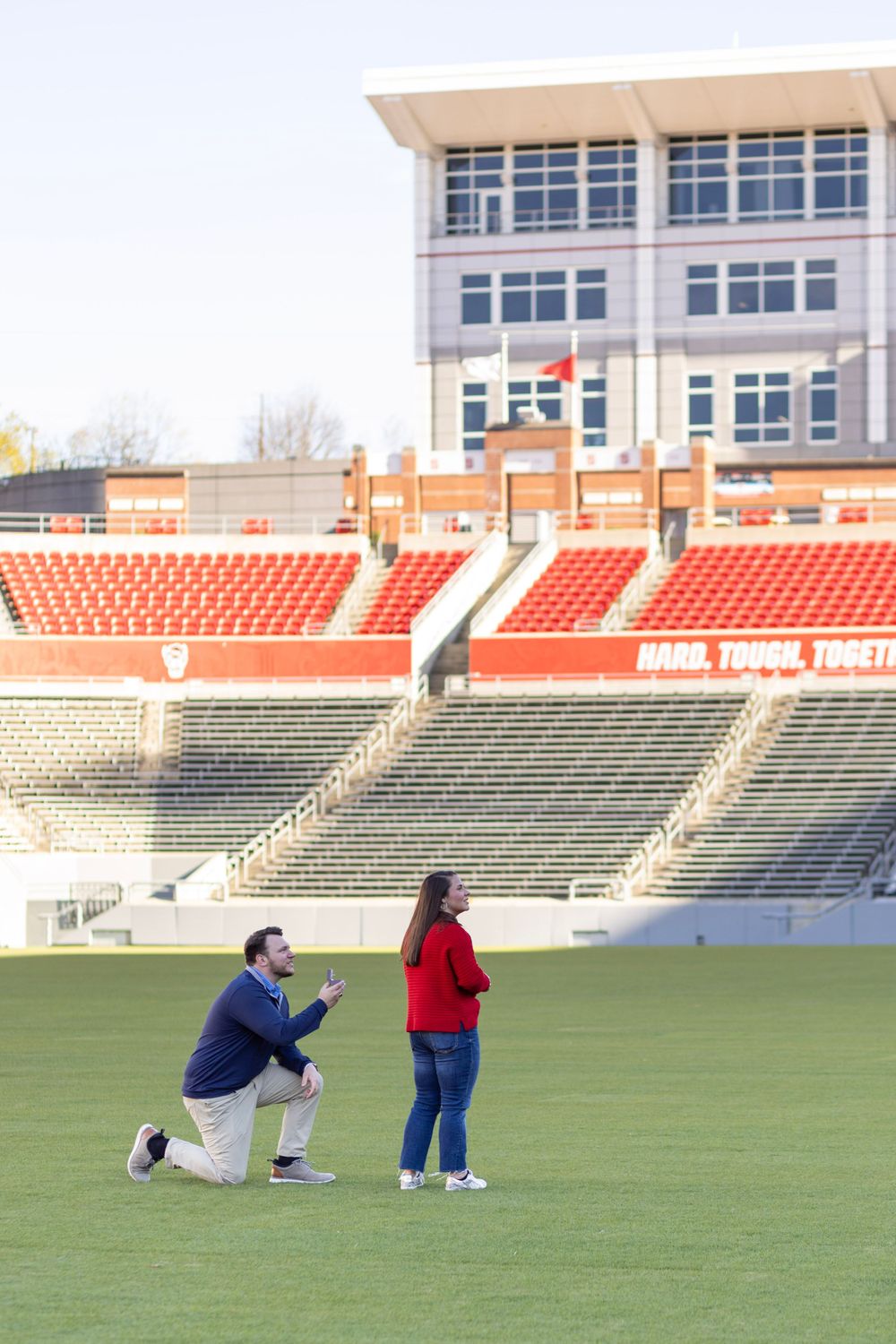 An engagement at Carter Finley Stadium at NC State University in Raleigh, NC.