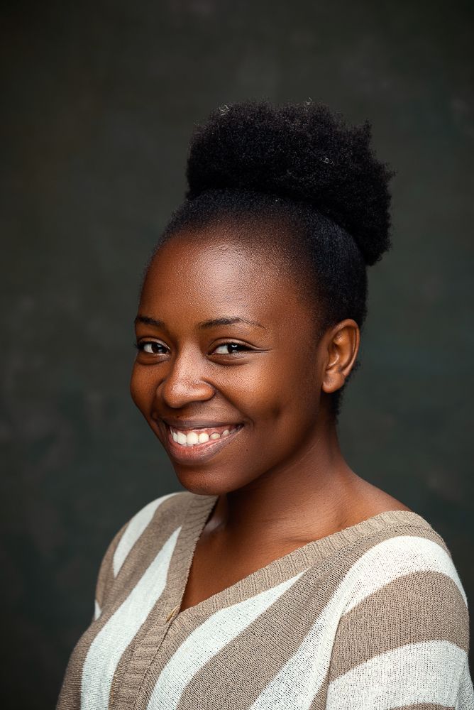 natural african hair female portrait with dimples