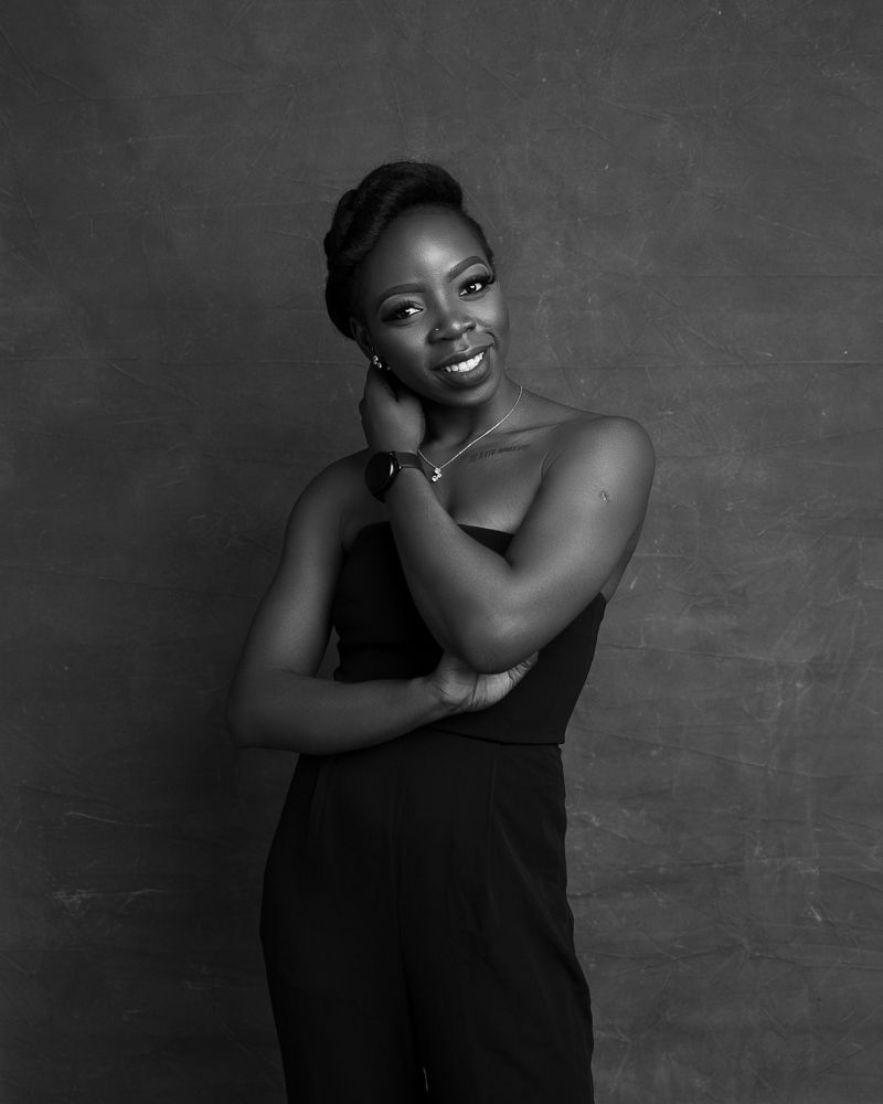 black and white female African portrait with tattoo