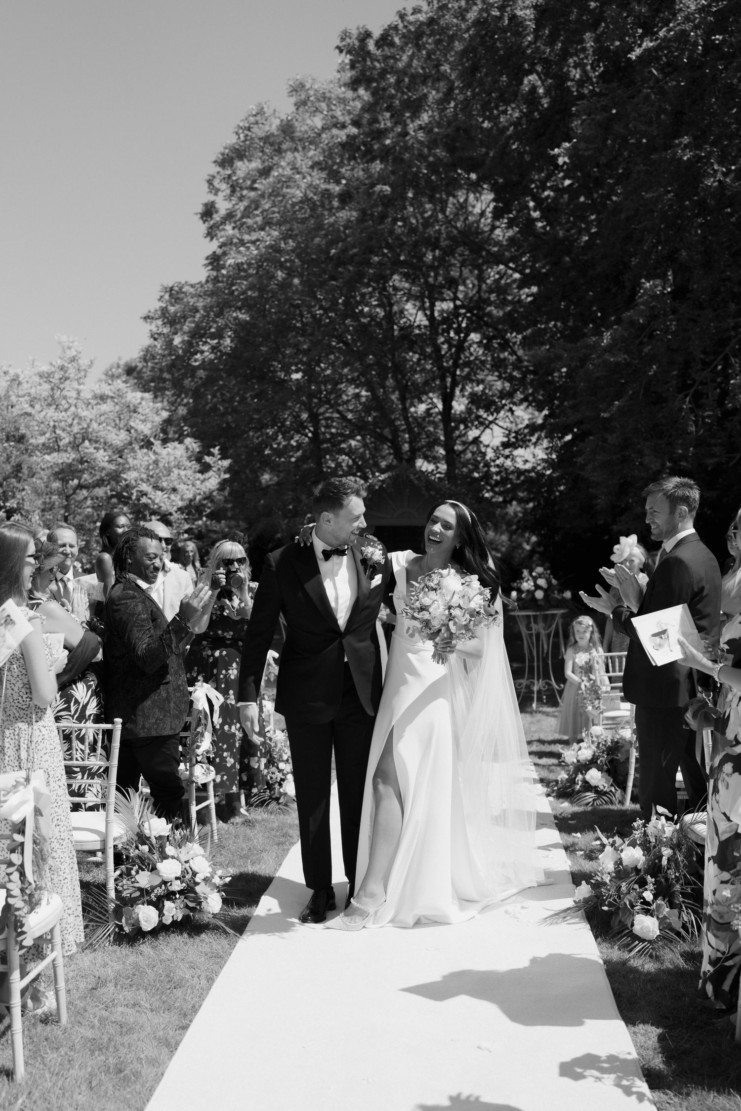 bride-and-groom-just-married-stockton-house-outdoor-wedding-ceremony