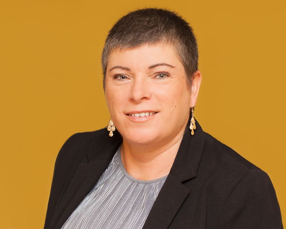 Headshot on yellow background