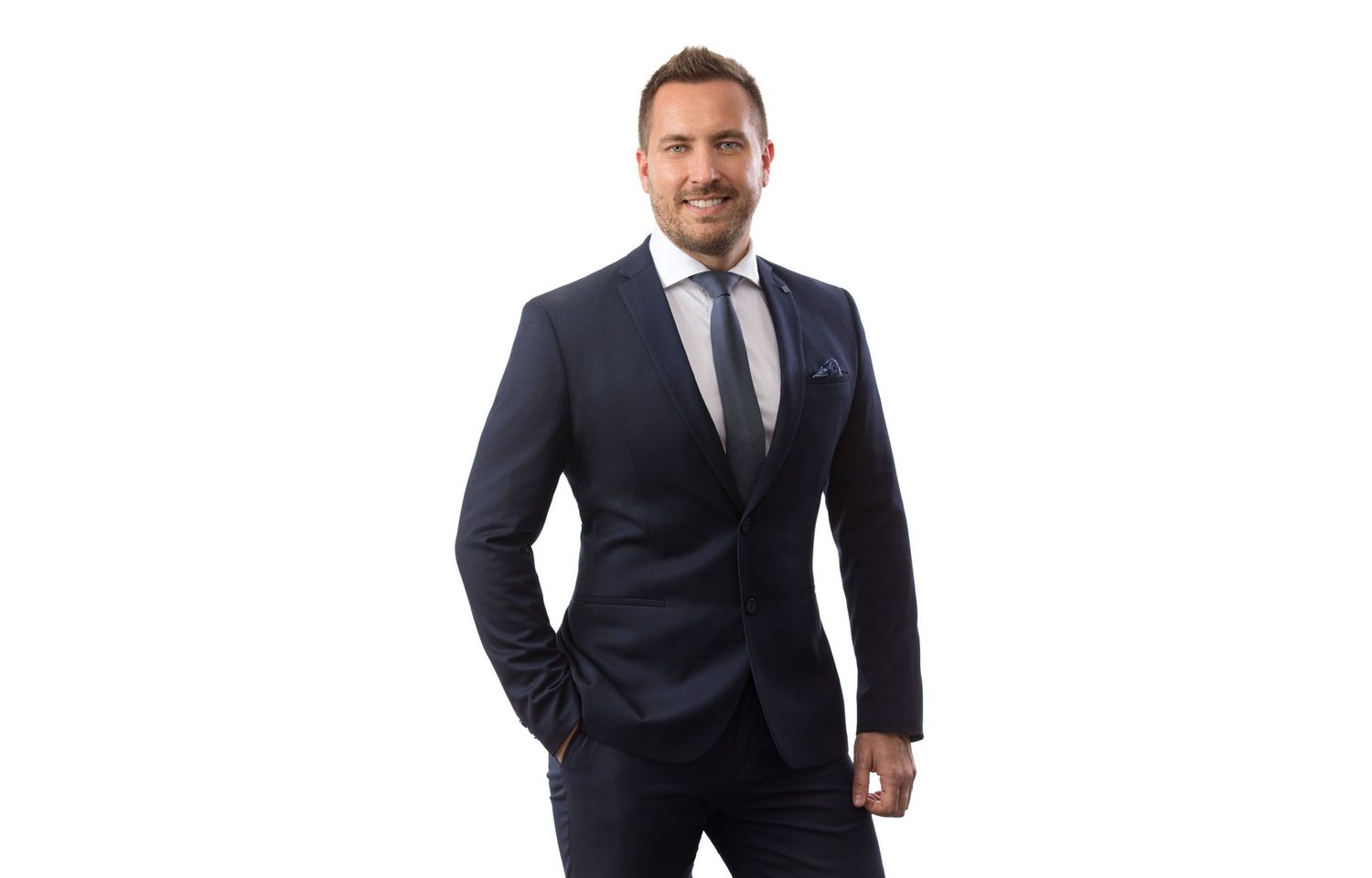 Professional business portraits in dark suits against white background.