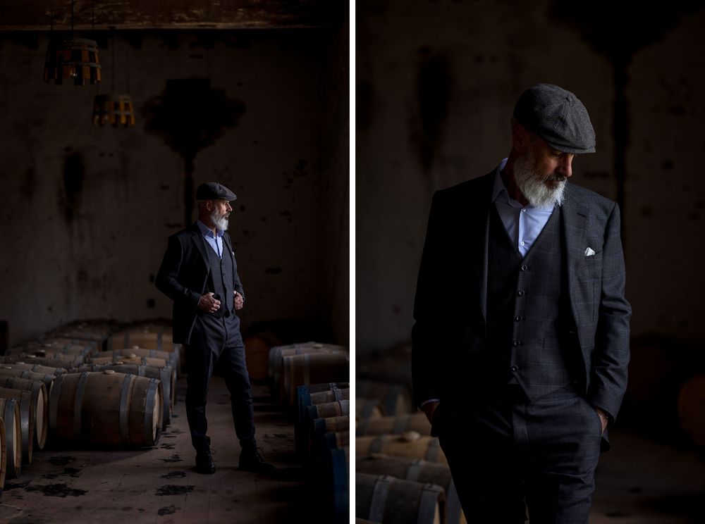 Glenn Nash wearing a handmade Houndstooth Tailors Suit Peaky Blinders style in the Corowa Distillery Barrel Room.