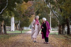Maggie Beer and Stephany Alexander walking in Autumn Leaves on a country Driveway