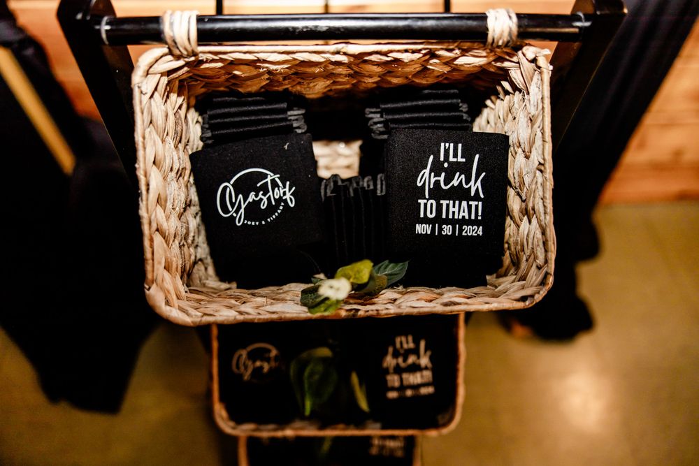 Rustic wedding signage with chalkboard messages and wooden frames.