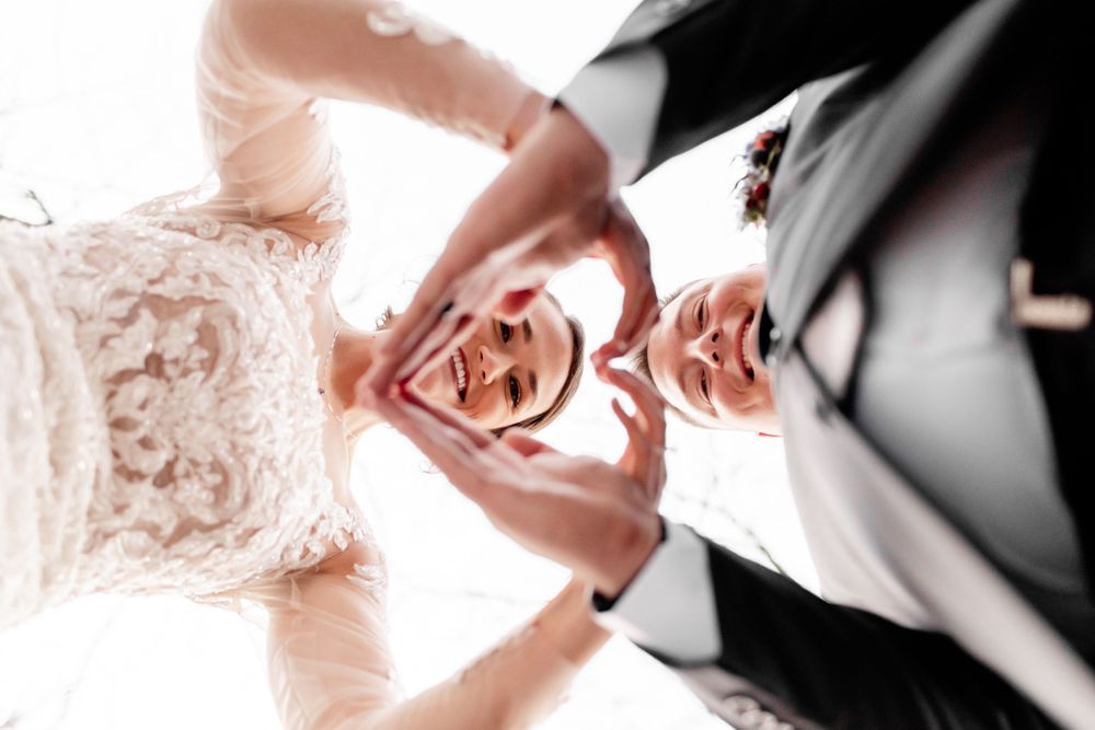 Artistic black and white detail shots of wedding dress lace and formal attire.