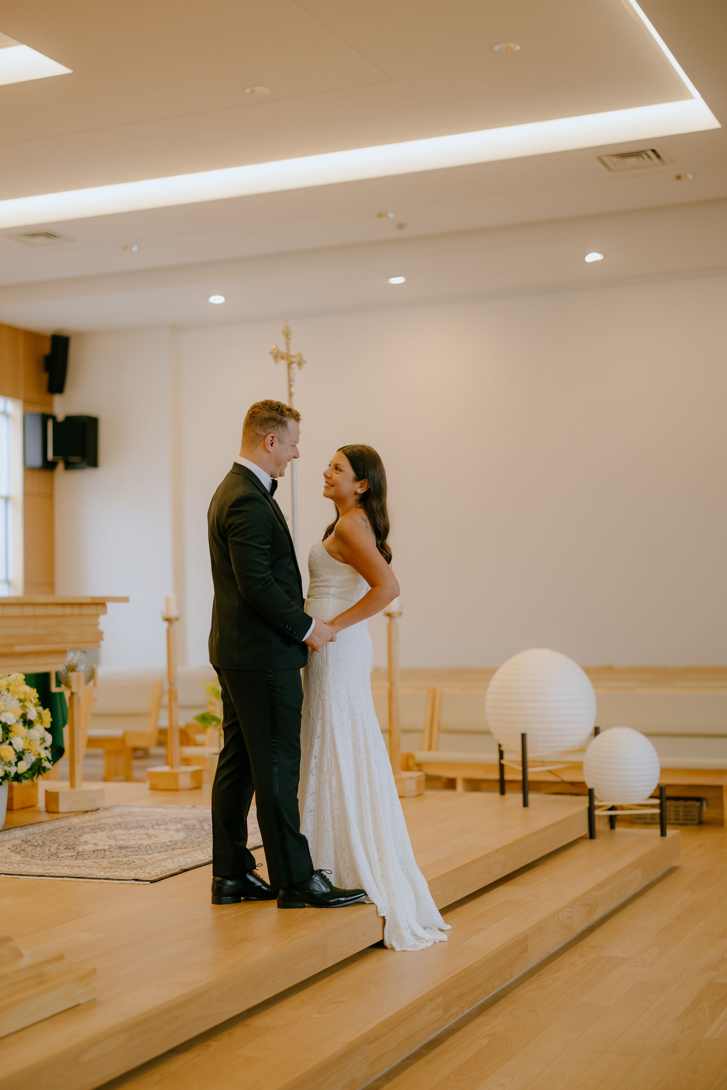 A sequence of wedding photos showing a couple sharing an intimate moment in a minimalist church setting.