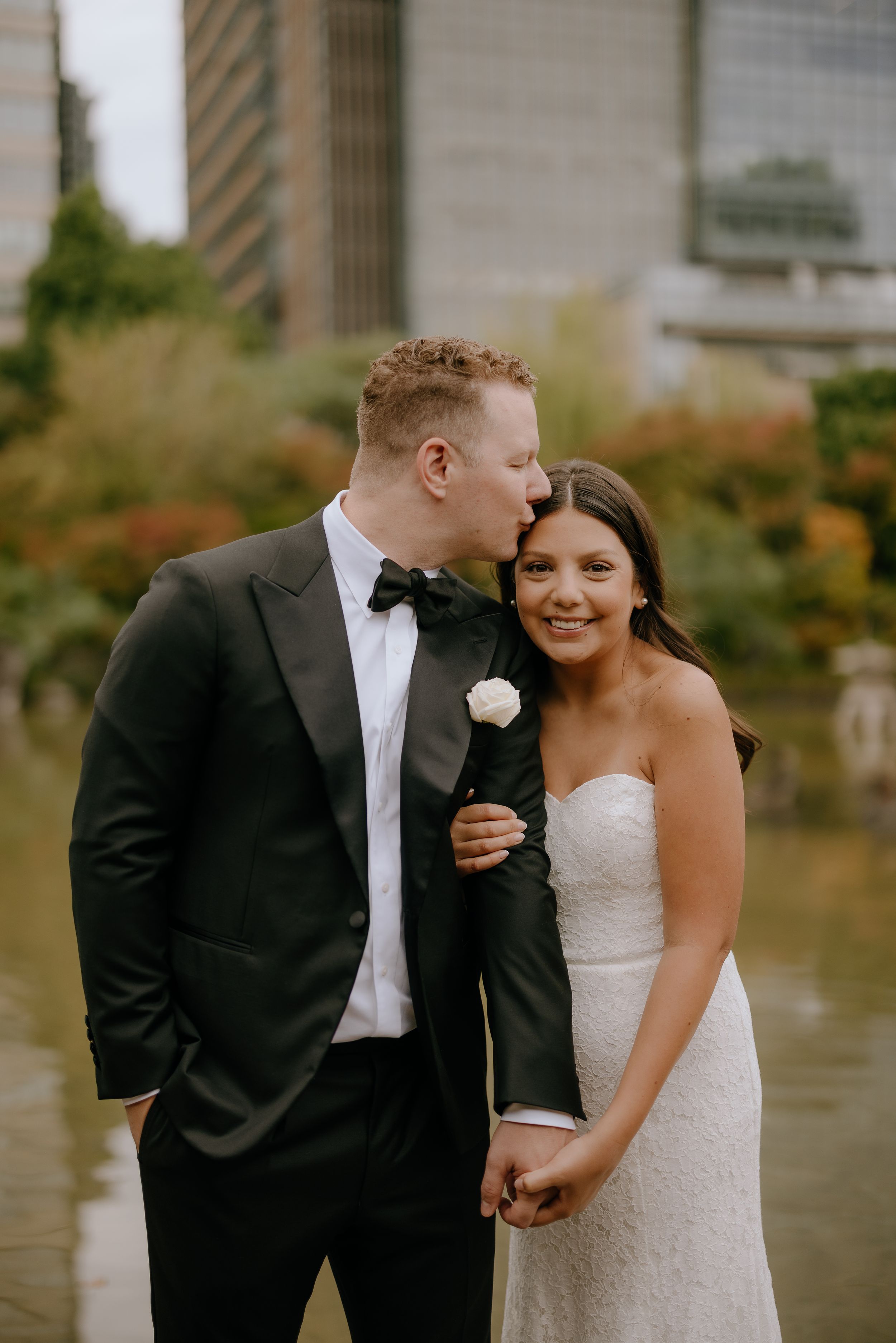 A series of candid wedding portraits showing a couple laughing and embracing outdoors.