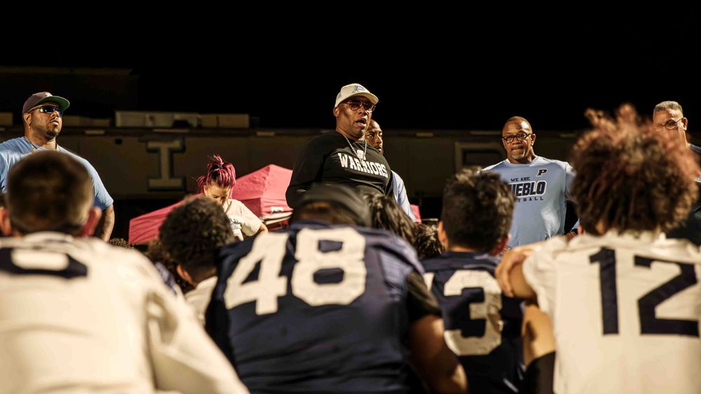 head coach speaking to team