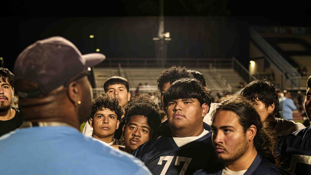 head coach speaking to team