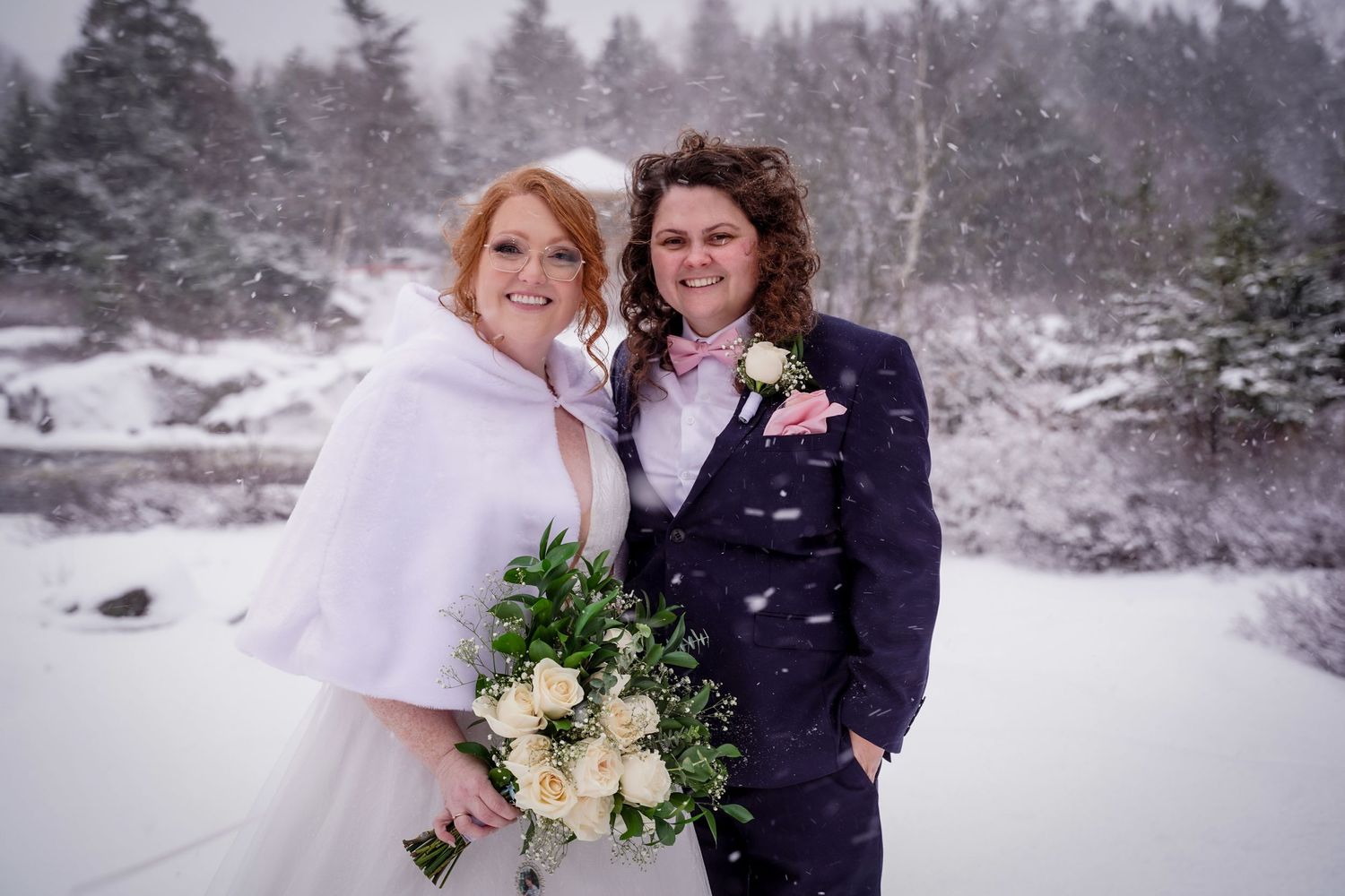 "A couple in a winter storm at Manuels River Hibernia Interpretation Centre, CBS, during their wedding