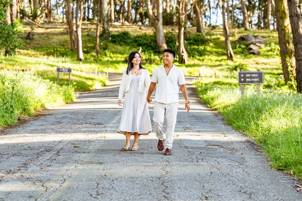 Couple taking a walk through Junipero Serra Park