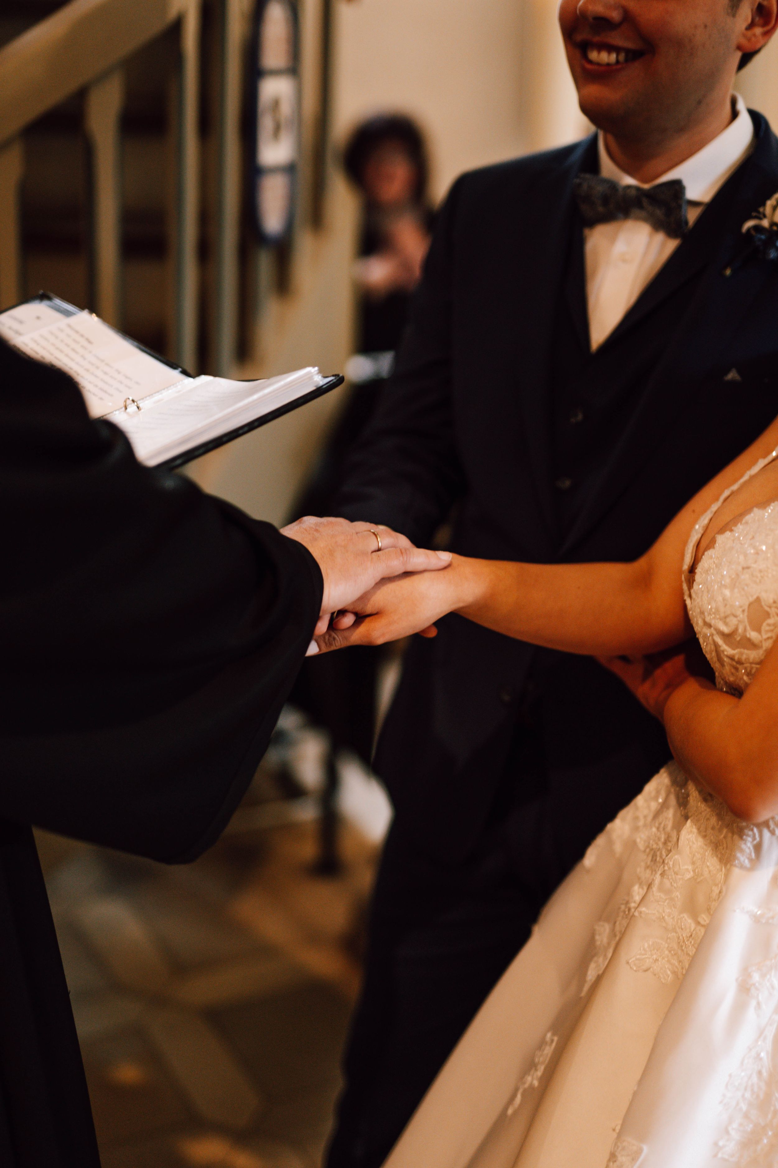 Intimate moment shared between newlyweds during their church wedding ceremony.