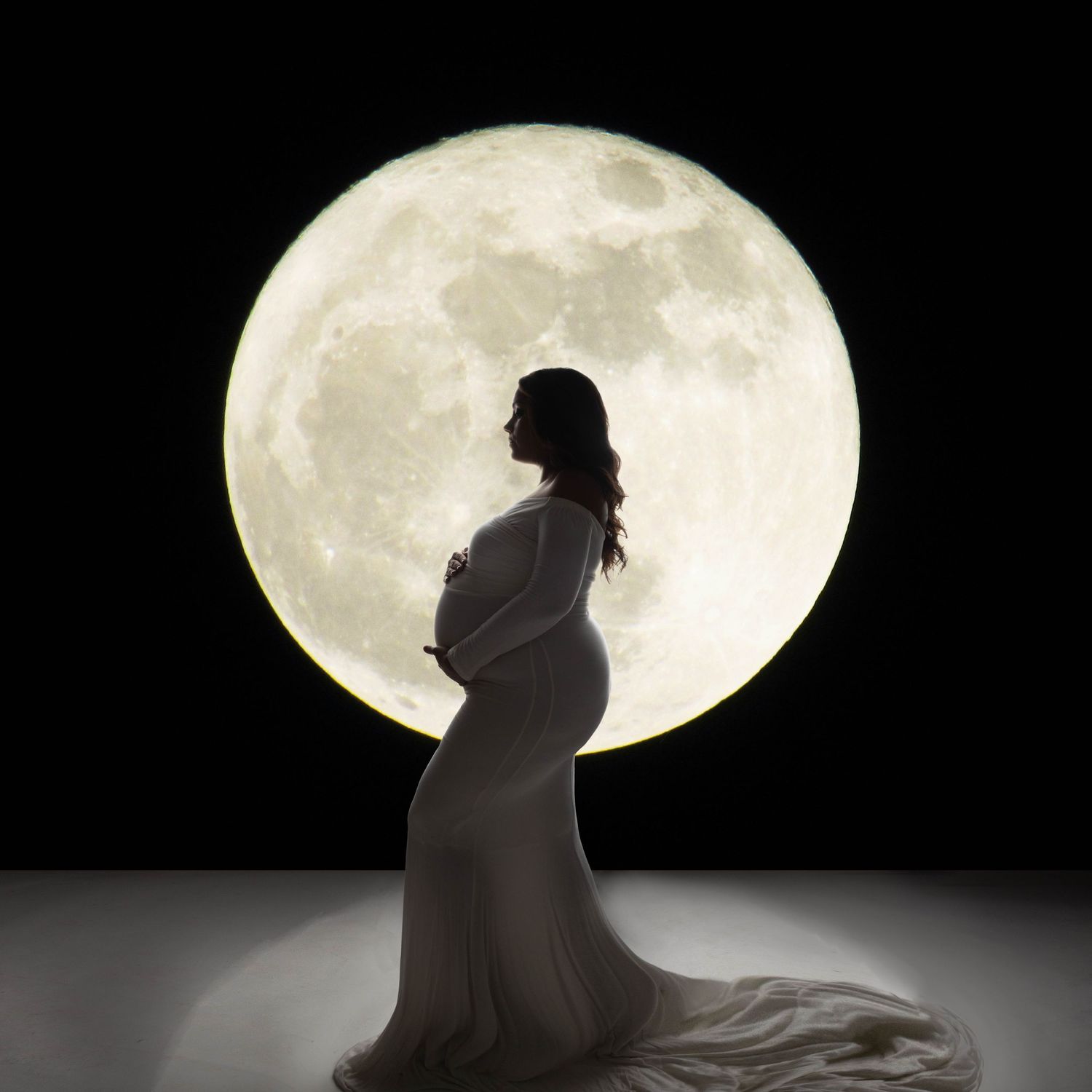 Long Island photo studio with a pregnant model. The background was photoshopped.