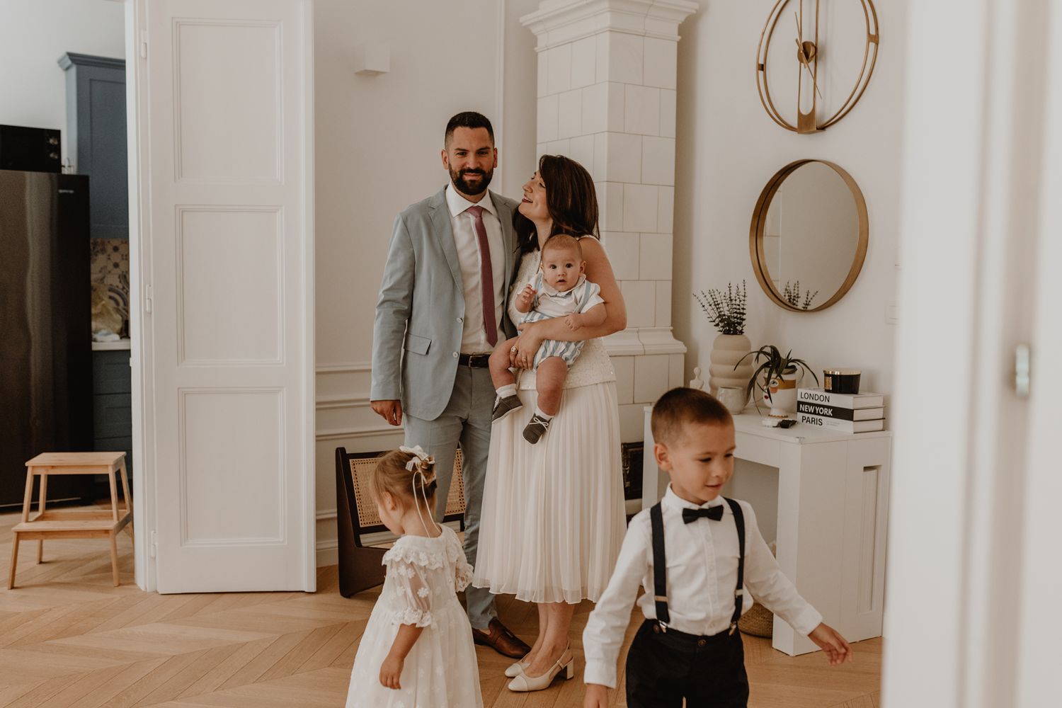Warm and intimate family session at home, capturing the joyful anticipation before the the christening..