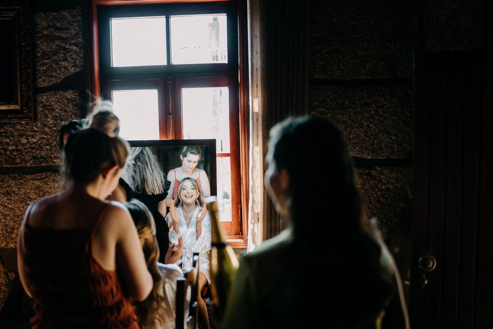 Natural light streaming through window during wedding preparation.