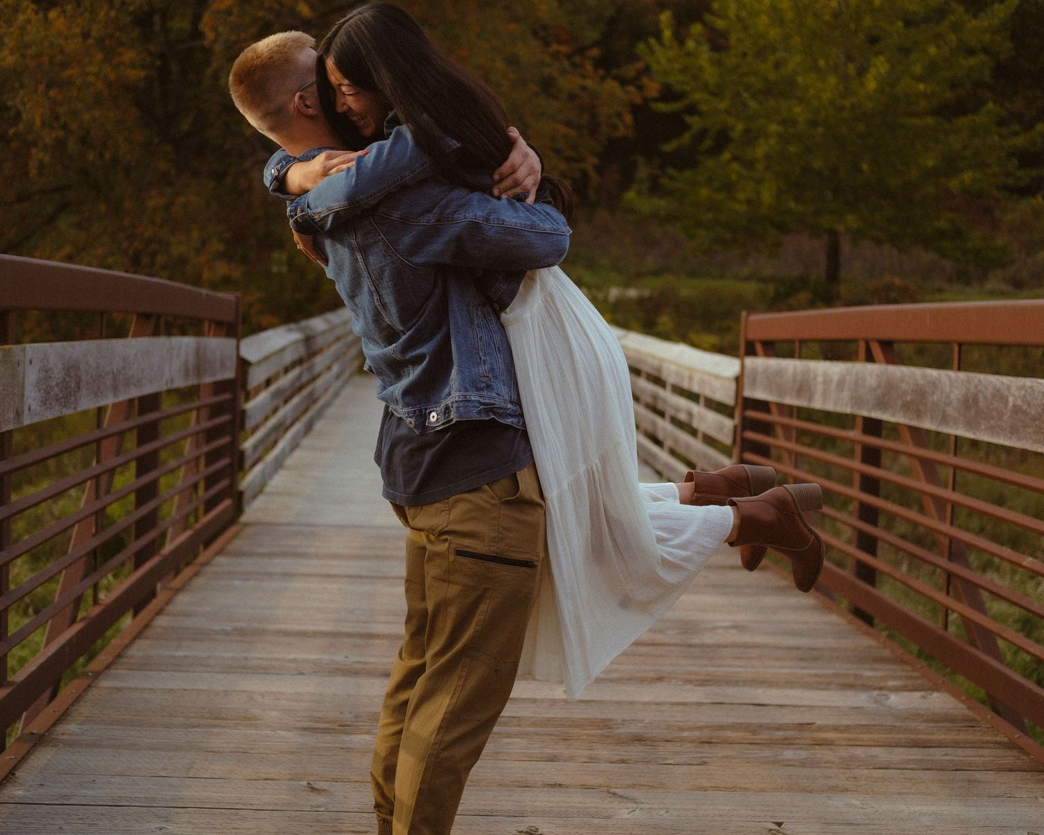 Happy engaged couple in park