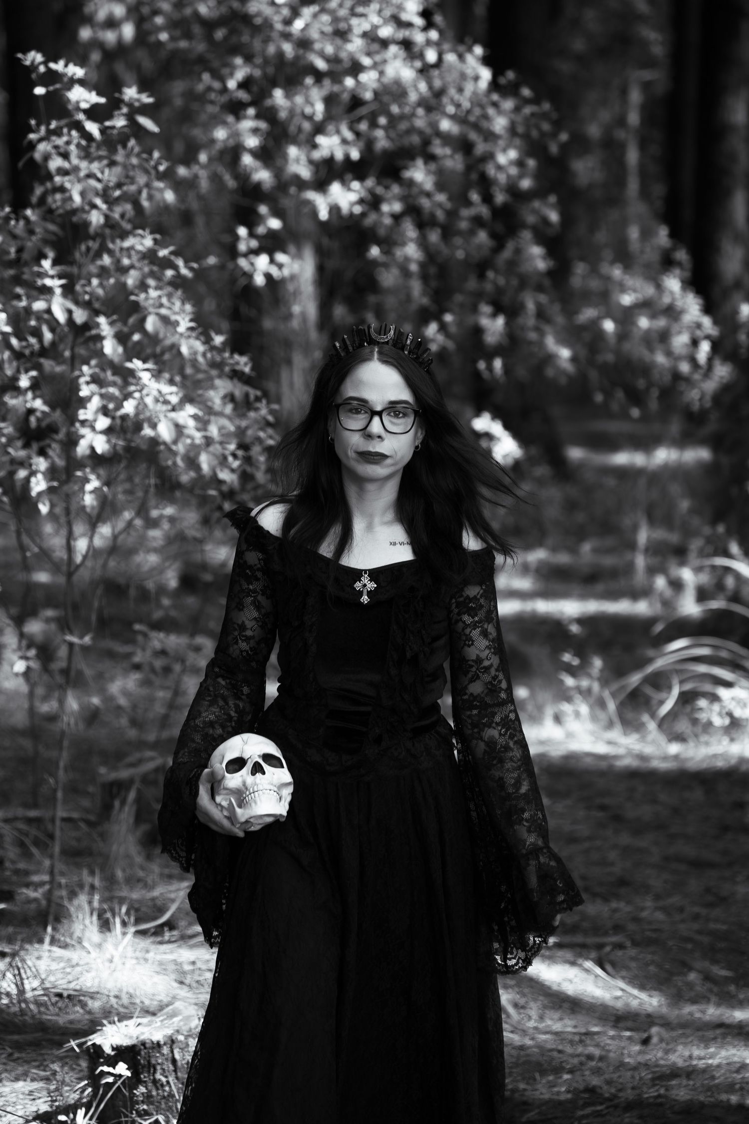 Woman dressed as a witch, photoshoot in the woods