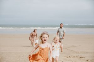 Kids running on the beach in Ocean Grove