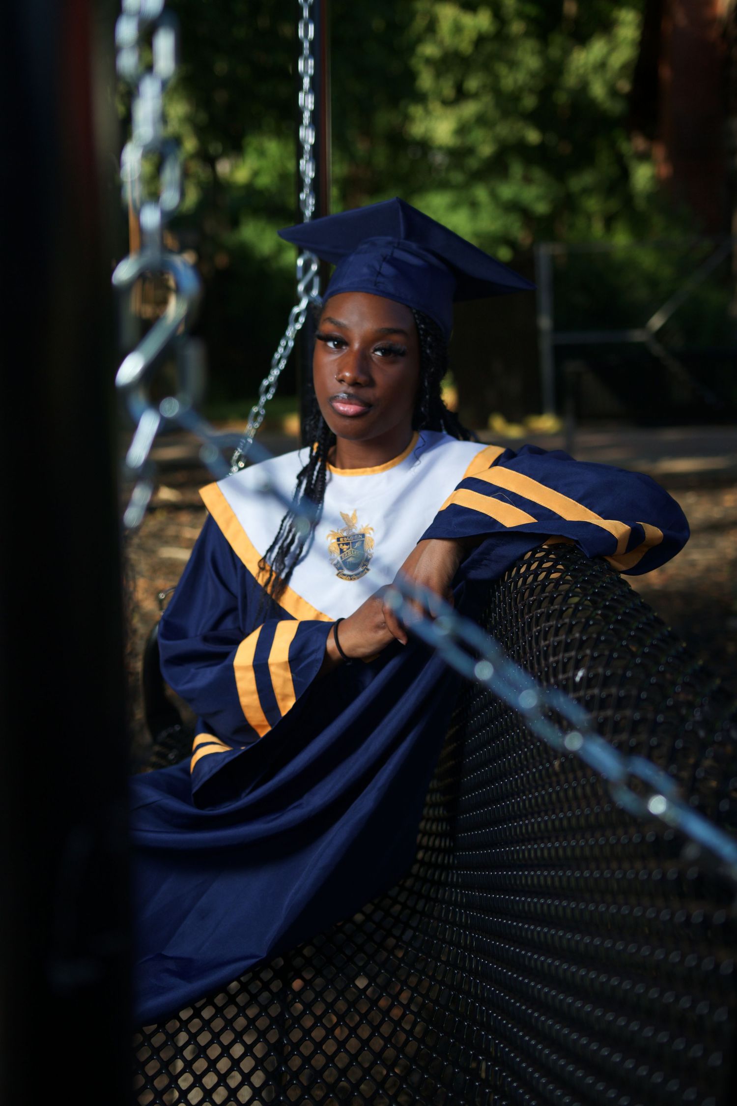 Graduation portrait session at McDonough High School in McDonough, Georgia with cap and gown