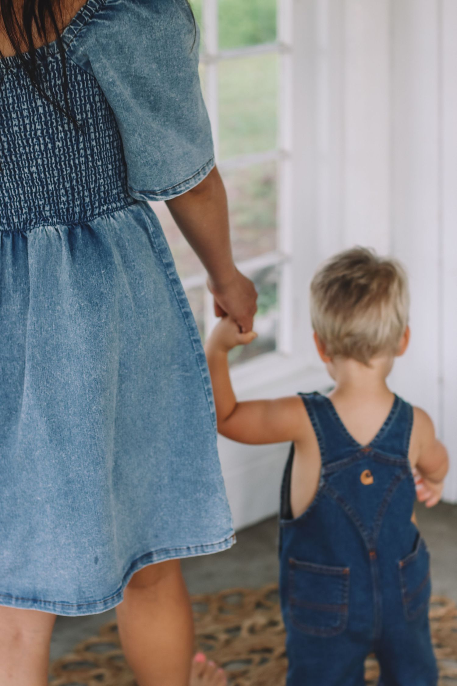 mother and son with denim outfits