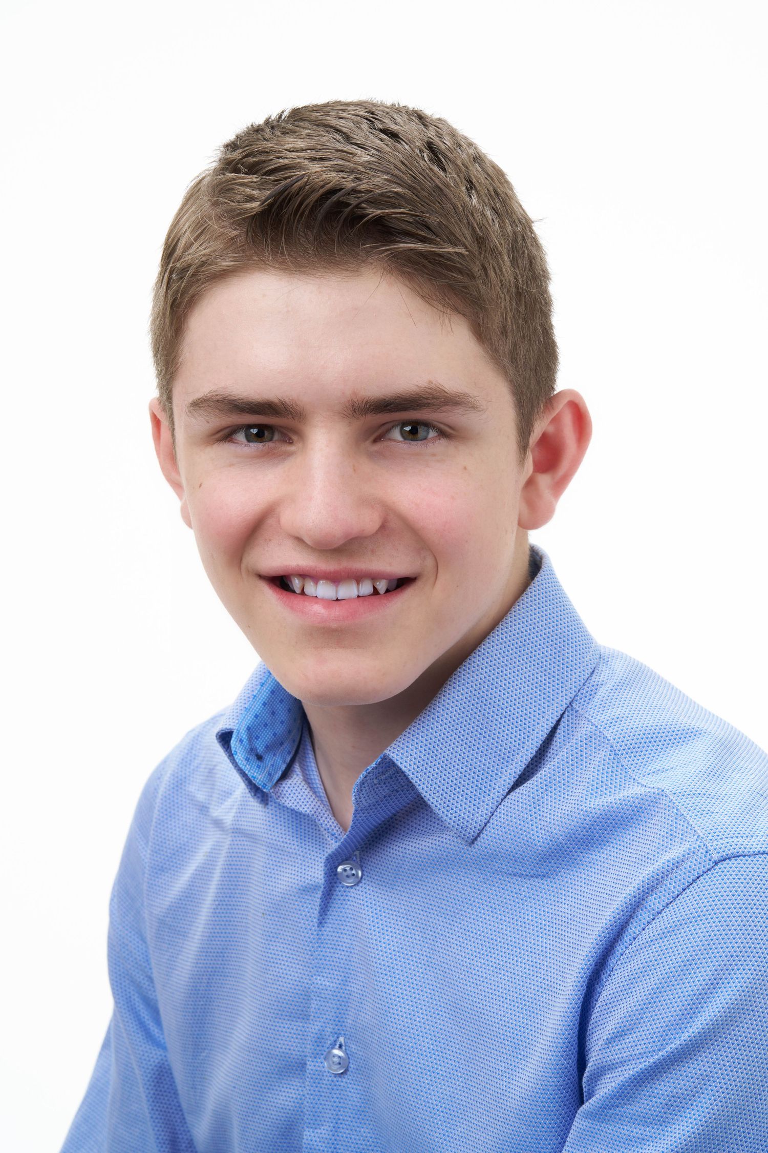 Micah Bowman, Owner and Founder of Bowman Studios Poses for a Portrait