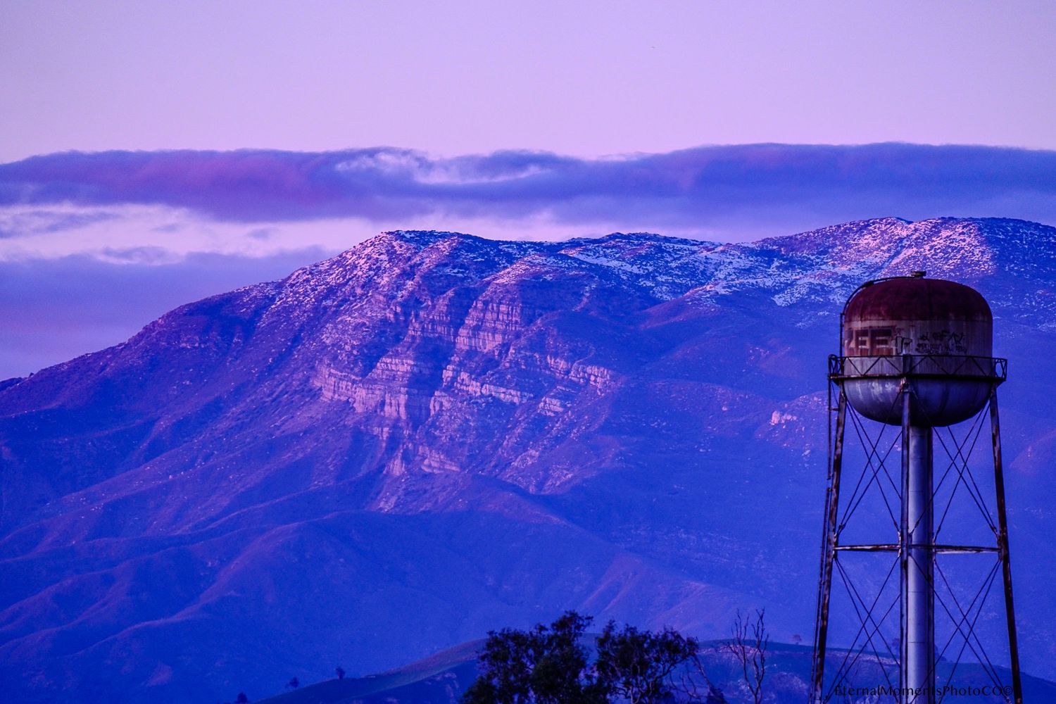Purple-hued sunset over Topa Topa mountains in Ventura, California.