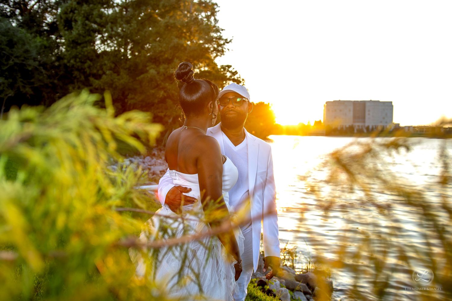 Golden sunset wedding photography session in a natural outdoor setting.