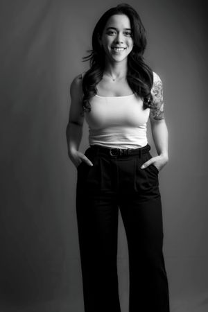 Studio fashion portrait in black and white showing casual business style.