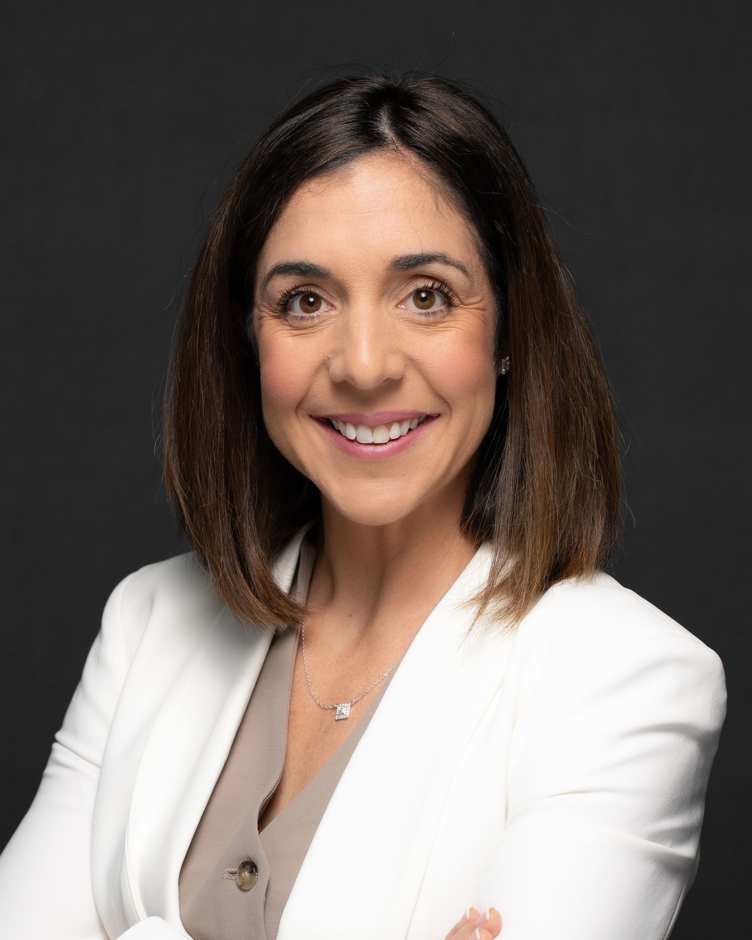 Smiling woman posing for a professional headshot